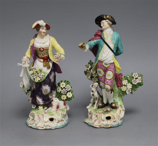 A pair of Derby style figures tallest 21cm